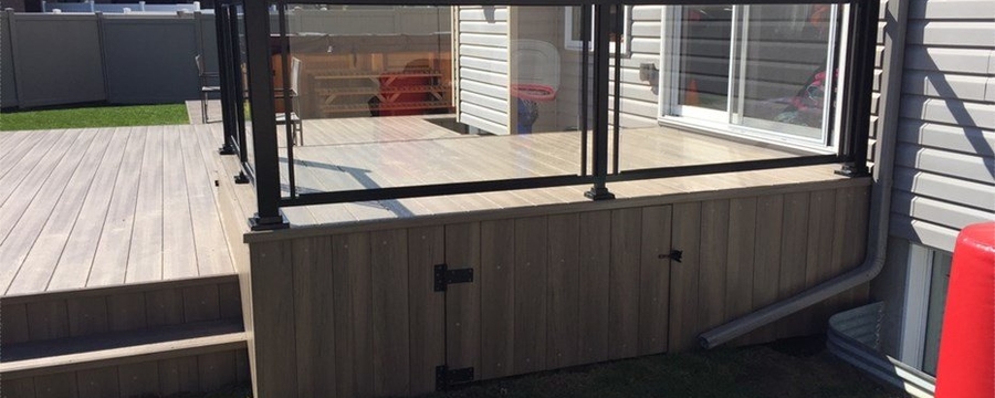 Wood deck with tempered glass surround